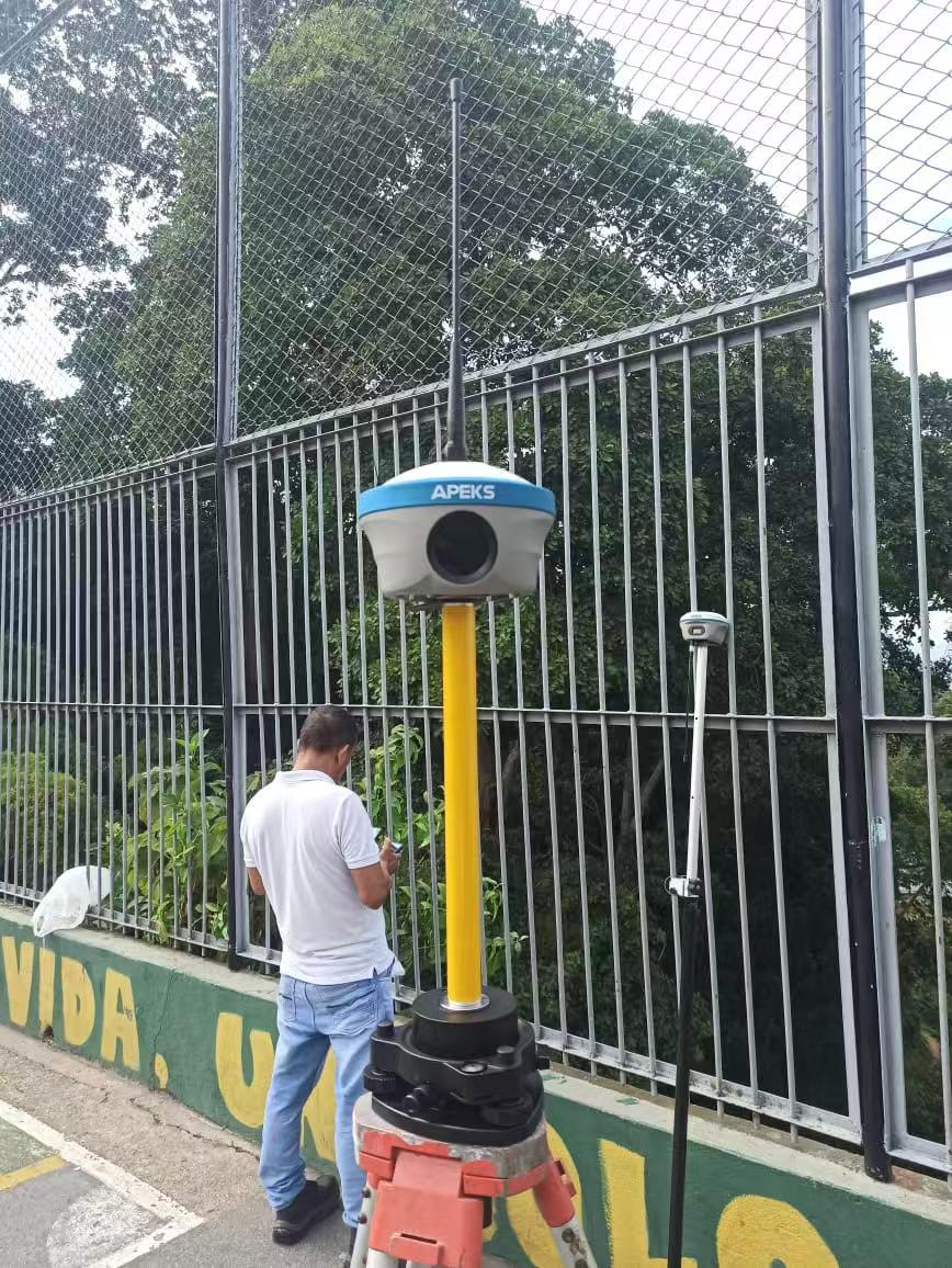 APEKS Max5 laser RTK GNSS base station set up in the field in Colombia